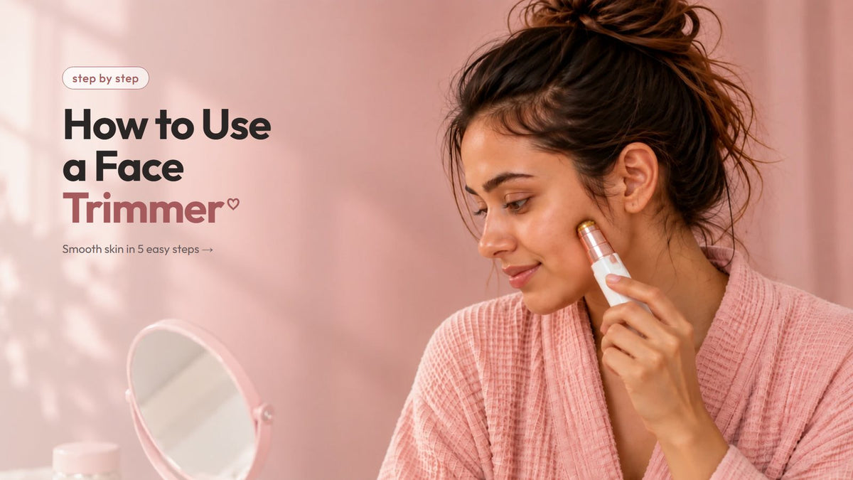 A woman gliding the white VIFERA 2-in-1 trimmer over her upper lip at a dressing table with a gold mirror