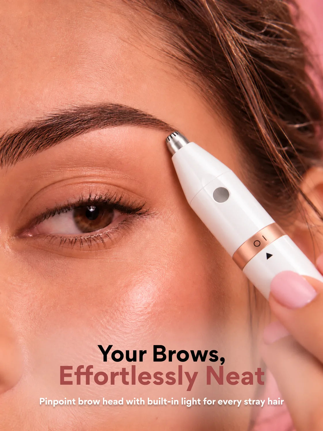 Shaping the brows with the grooming pen's lit brow head