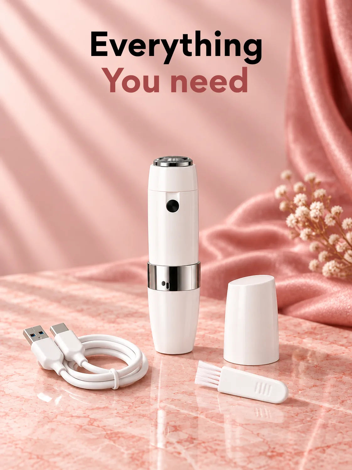 What is in the box: the Mini Hair Remover, its cap, a USB cable and a cleaning brush